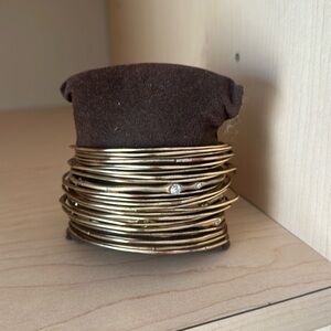 Brushed Gold Bangles, set of 28.